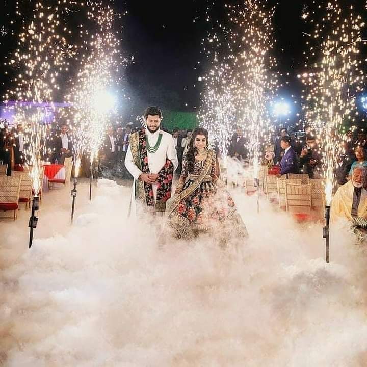 Foggy entry event with bride and groom, crafted by SARASWATI EVENTS, premier wedding planner in Siwan.