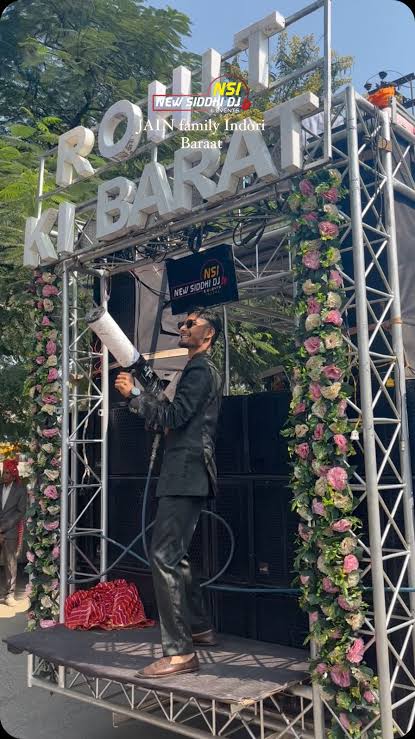 Fully-decorated Barat & DJ on Wheel in Siwan showcasing CO2 guns, dhol beats, and groom entry vibes.
