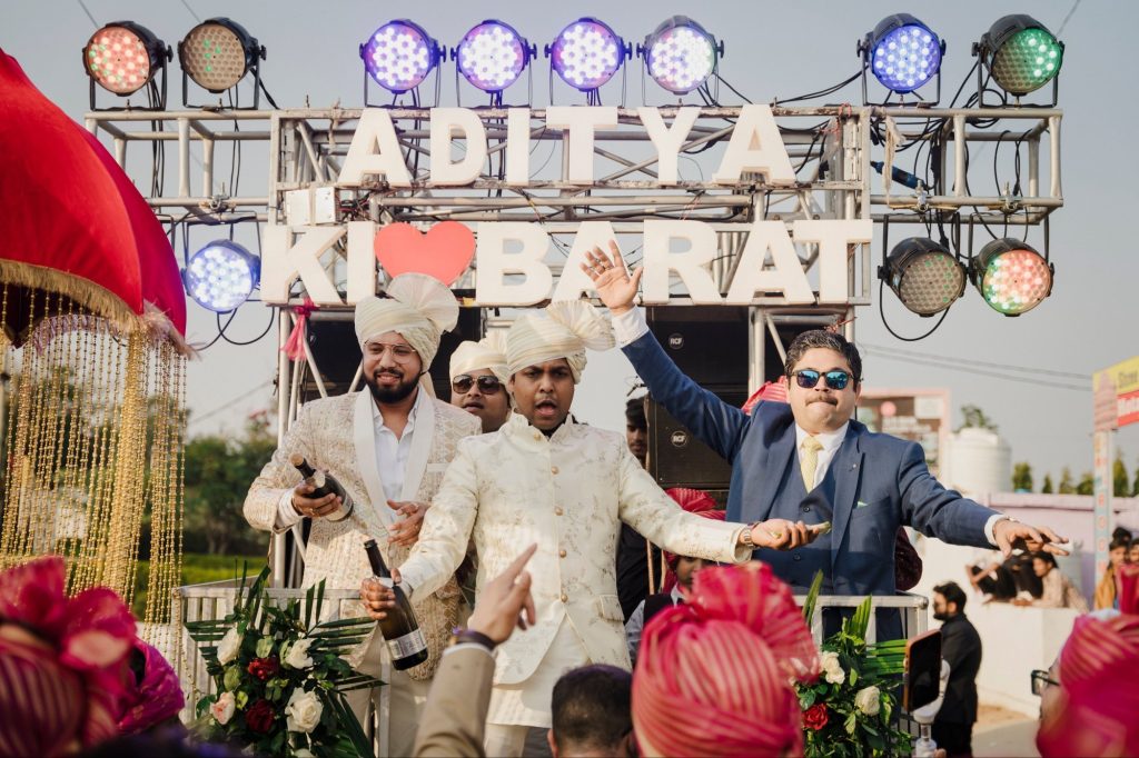 Fully-decorated Barat & DJ on Wheel in Azamgarh showcasing CO2 guns, dhol beats, and groom entry vibes.