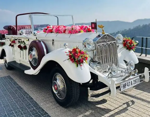 Vintage car rental in mau – Classic wedding car exterior by Sarswati Events.